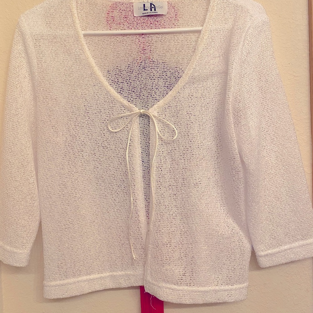White shrug.  Lightweight.  Gently used.